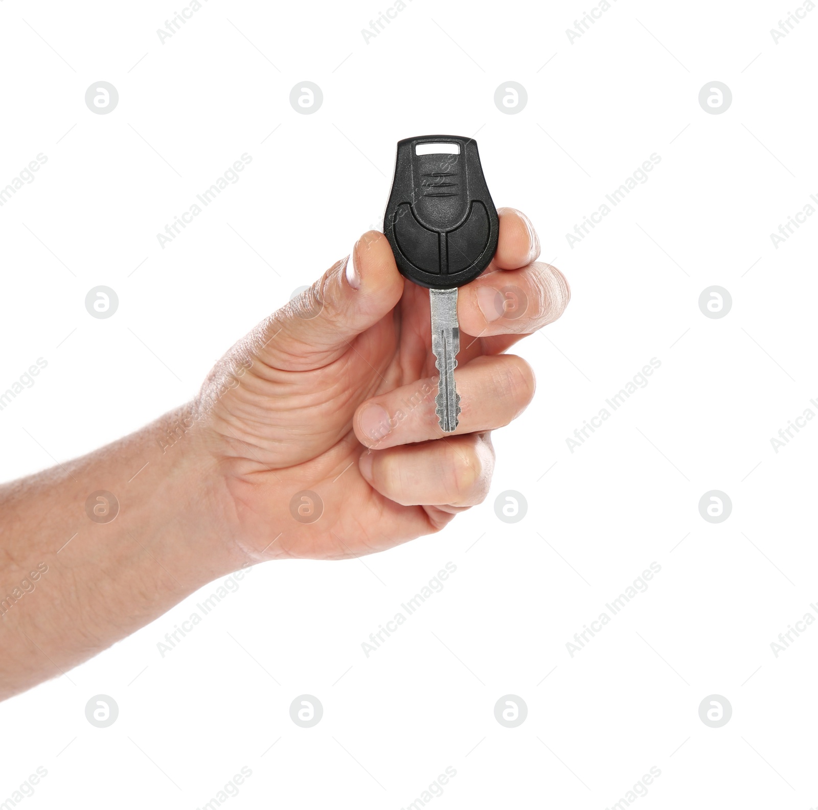 Photo of Man holding car key on white background, closeup. Getting driving license