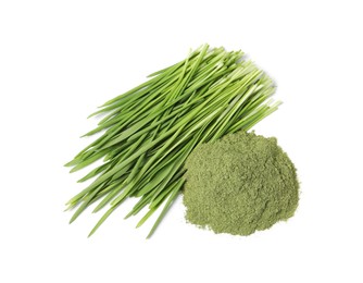 Photo of Pile of wheat grass powder and fresh sprouts isolated on white, top view