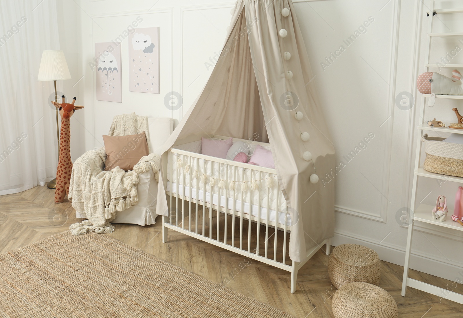 Photo of Baby room interior with toys and stylish furniture