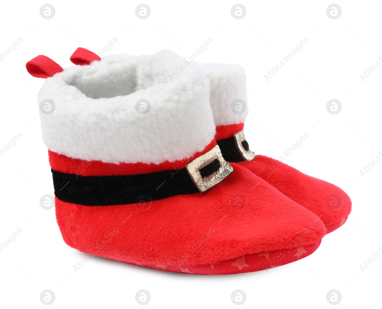 Photo of Cute small booties on white background. Christmas baby clothes