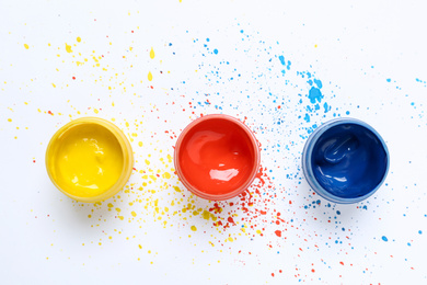 Photo of Flat lay composition with paints on white background