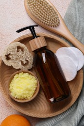 Flat lay composition with natural body scrub on beige textured table. Anti cellulite treatment
