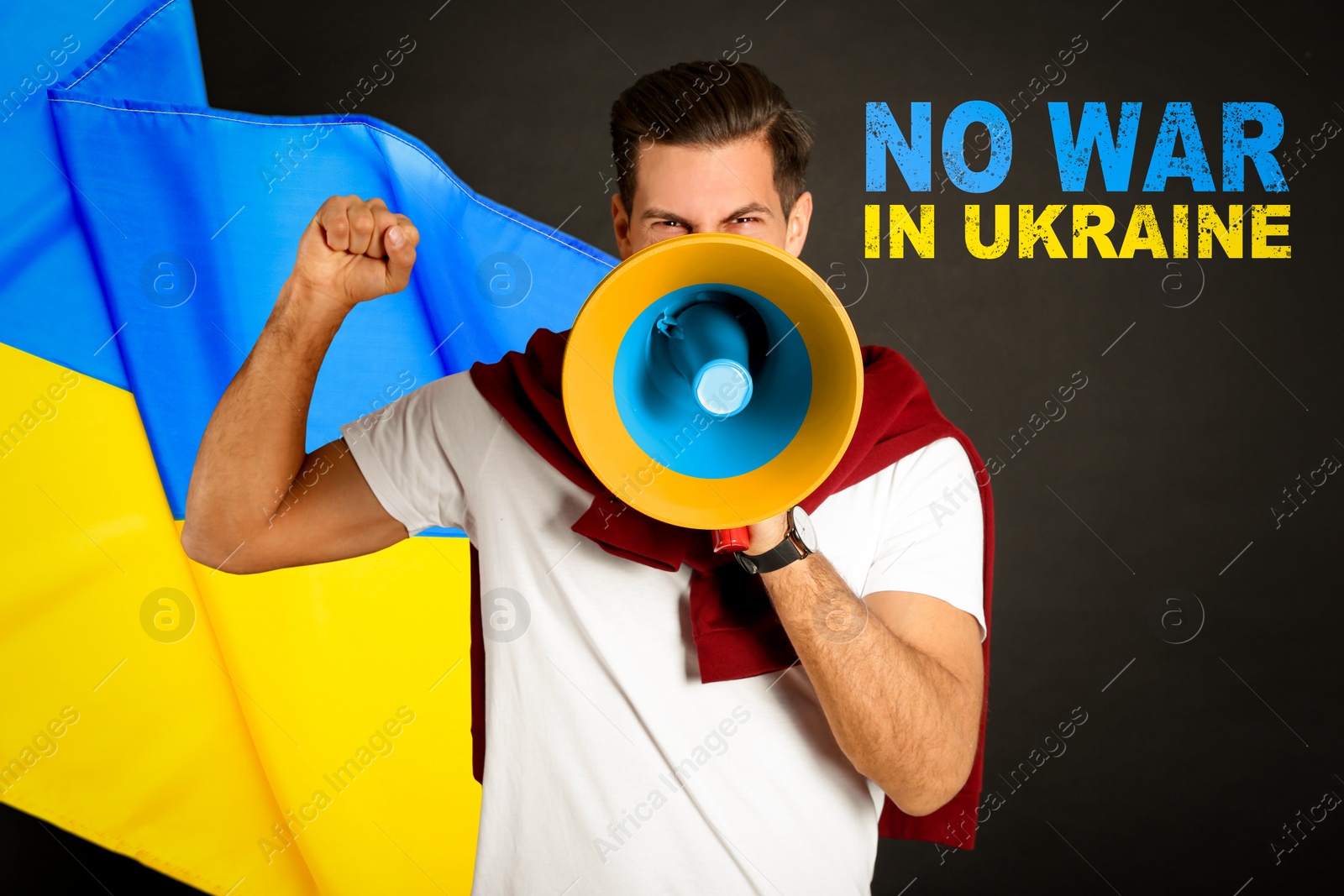 Image of Stop war in Ukraine. Man with megaphone and Ukrainian national flag on black background