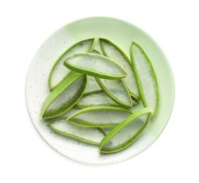 Plate with fresh aloe vera slices isolated on white, top view