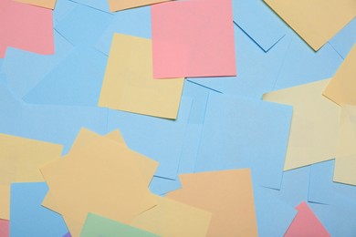Photo of Many colorful stickers as background, above view