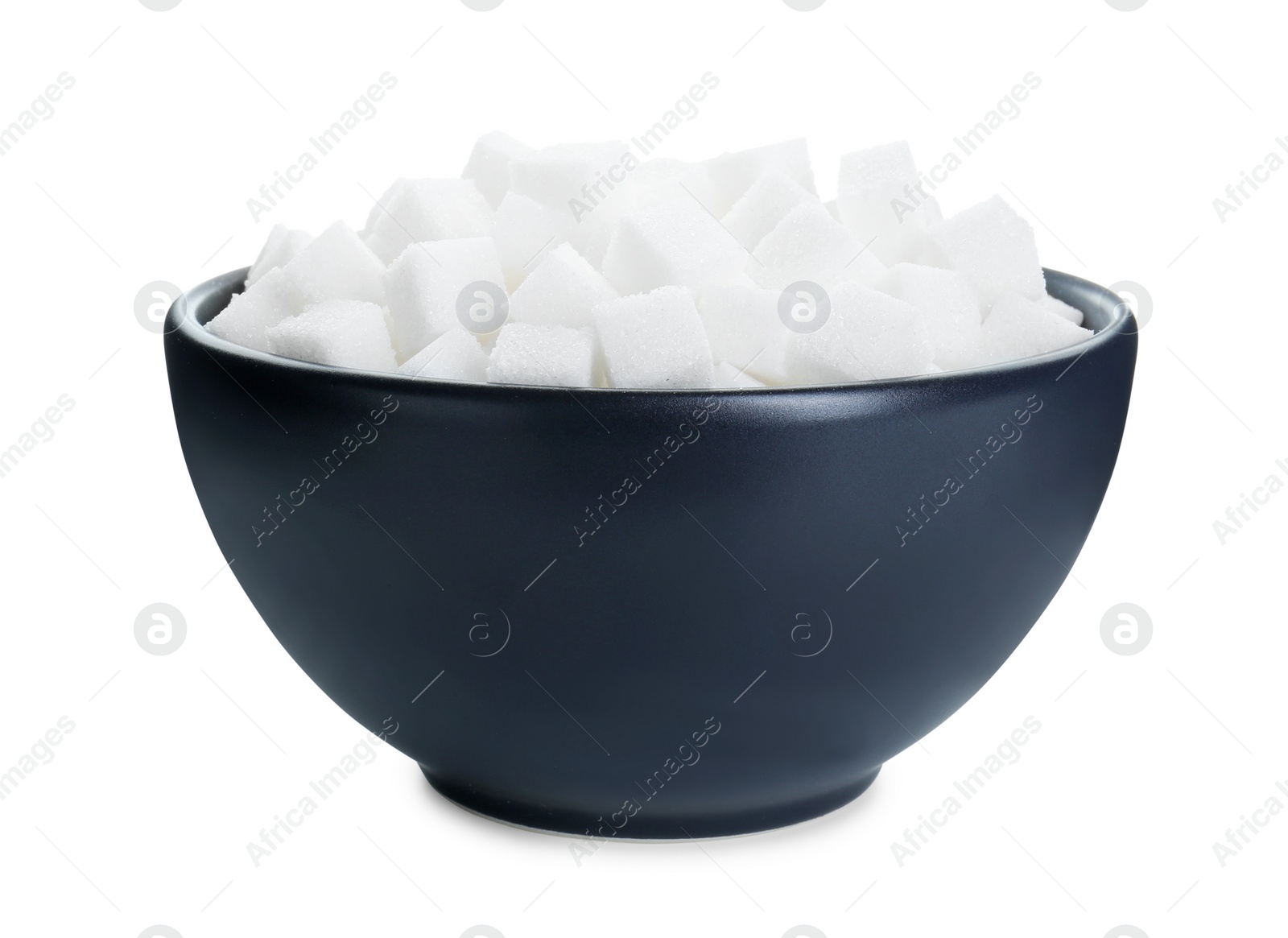 Photo of Sugar cubes in bowl isolated on white