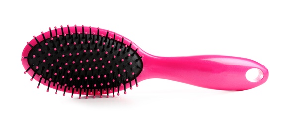 Photo of New modern hair brush on white background