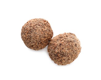 Photo of Delicious chocolate truffles on white background, top view