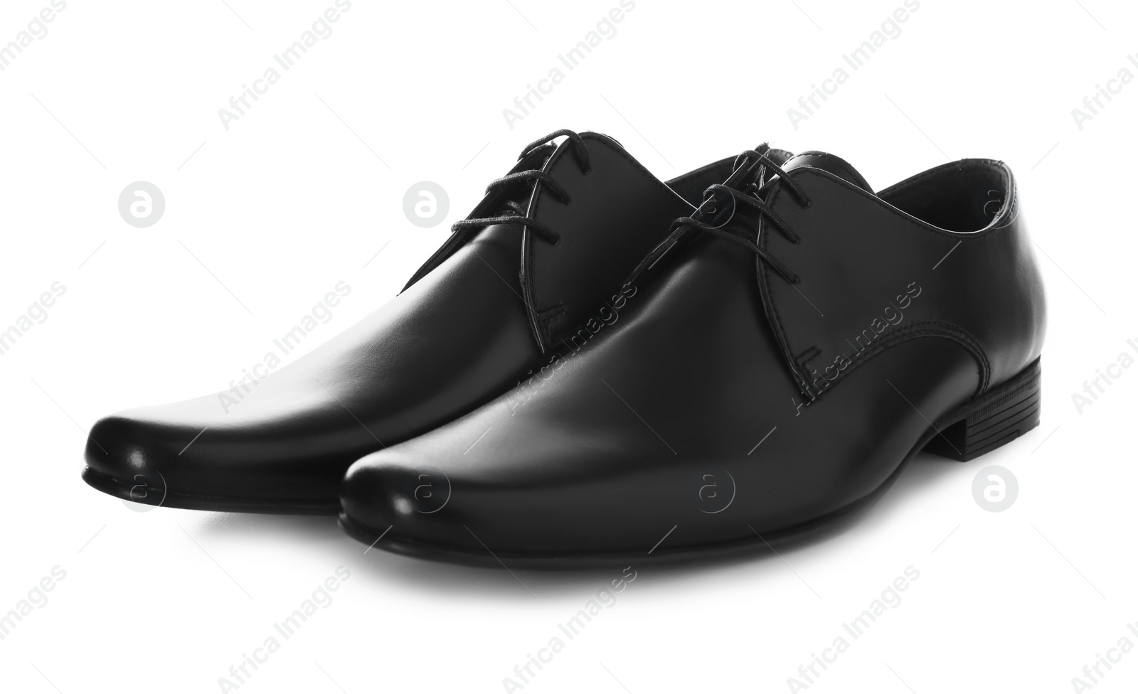 Photo of Elegant male shoes on white background