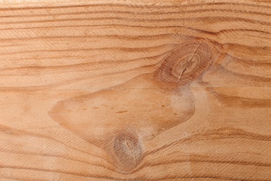 Brown rustic wooden surface as background, closeup