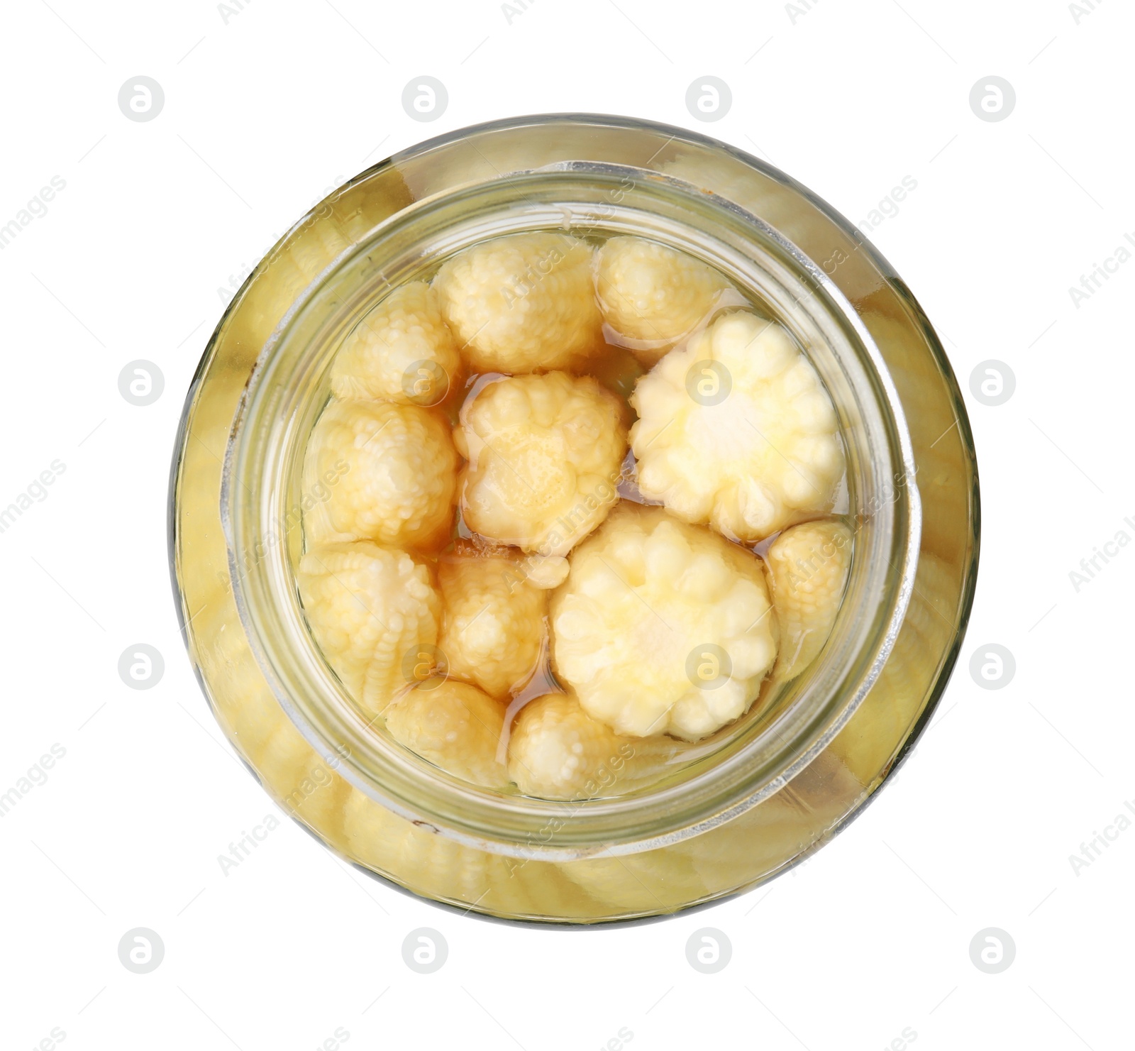 Photo of Tasty fresh yellow baby corns in glass jar isolated on white, top view