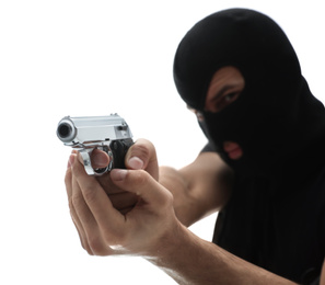 Professional killer with gun on white background