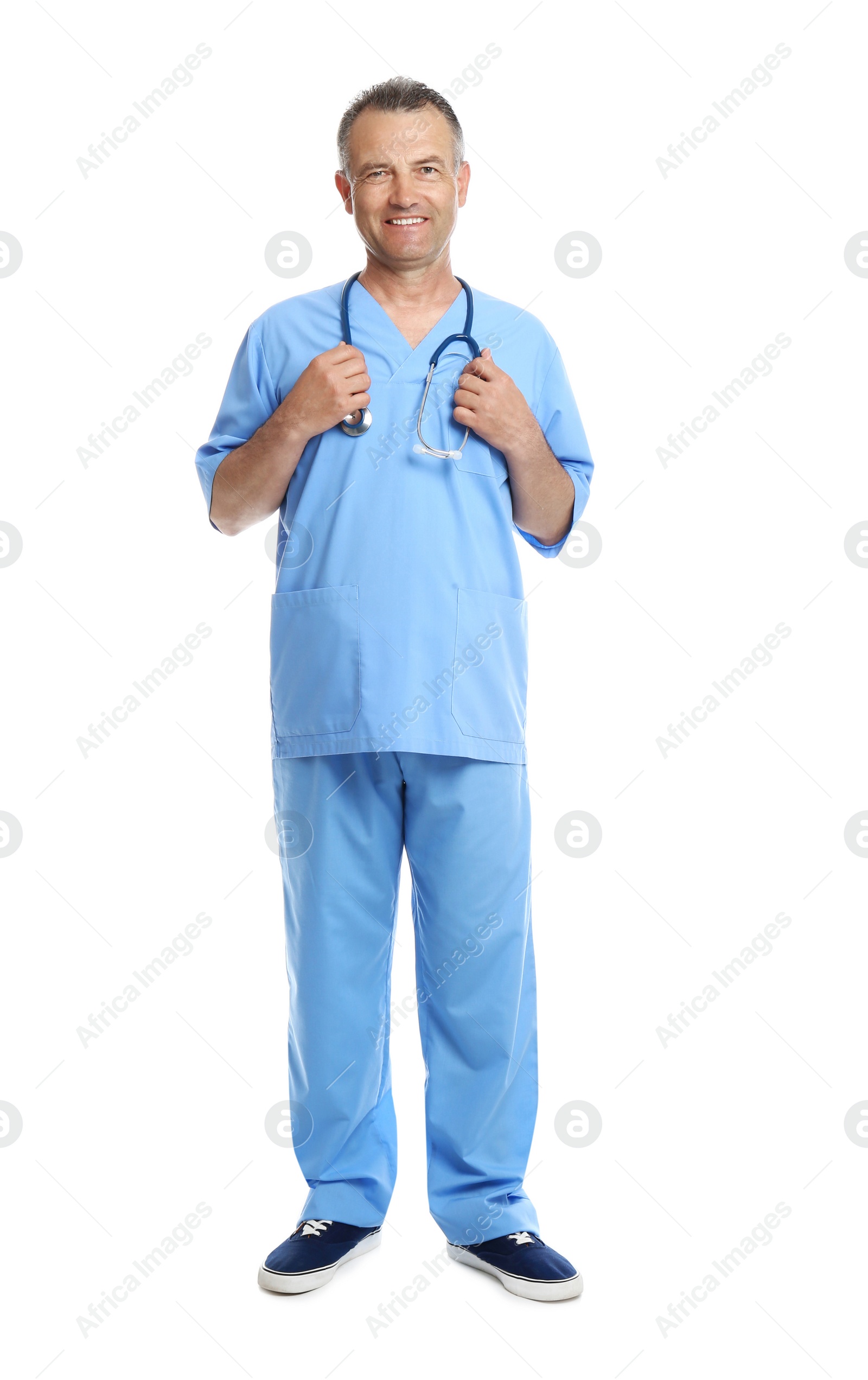 Photo of Full length portrait of experienced doctor in uniform on white background. Medical service