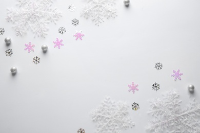 Photo of Flat lay composition with Christmas decorations on white background, space for text