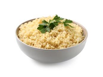 Photo of Delicious bulgur with parsley in bowl isolated on white