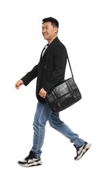 Man with bag walking on white background