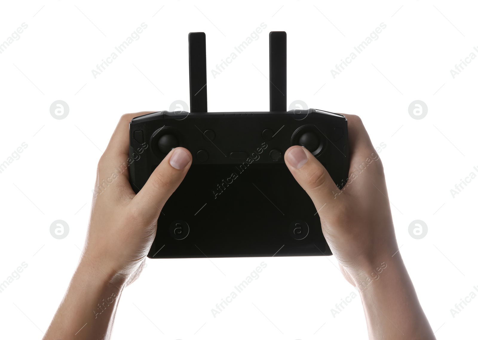 Photo of Man holding modern drone controller on white background, closeup of hands