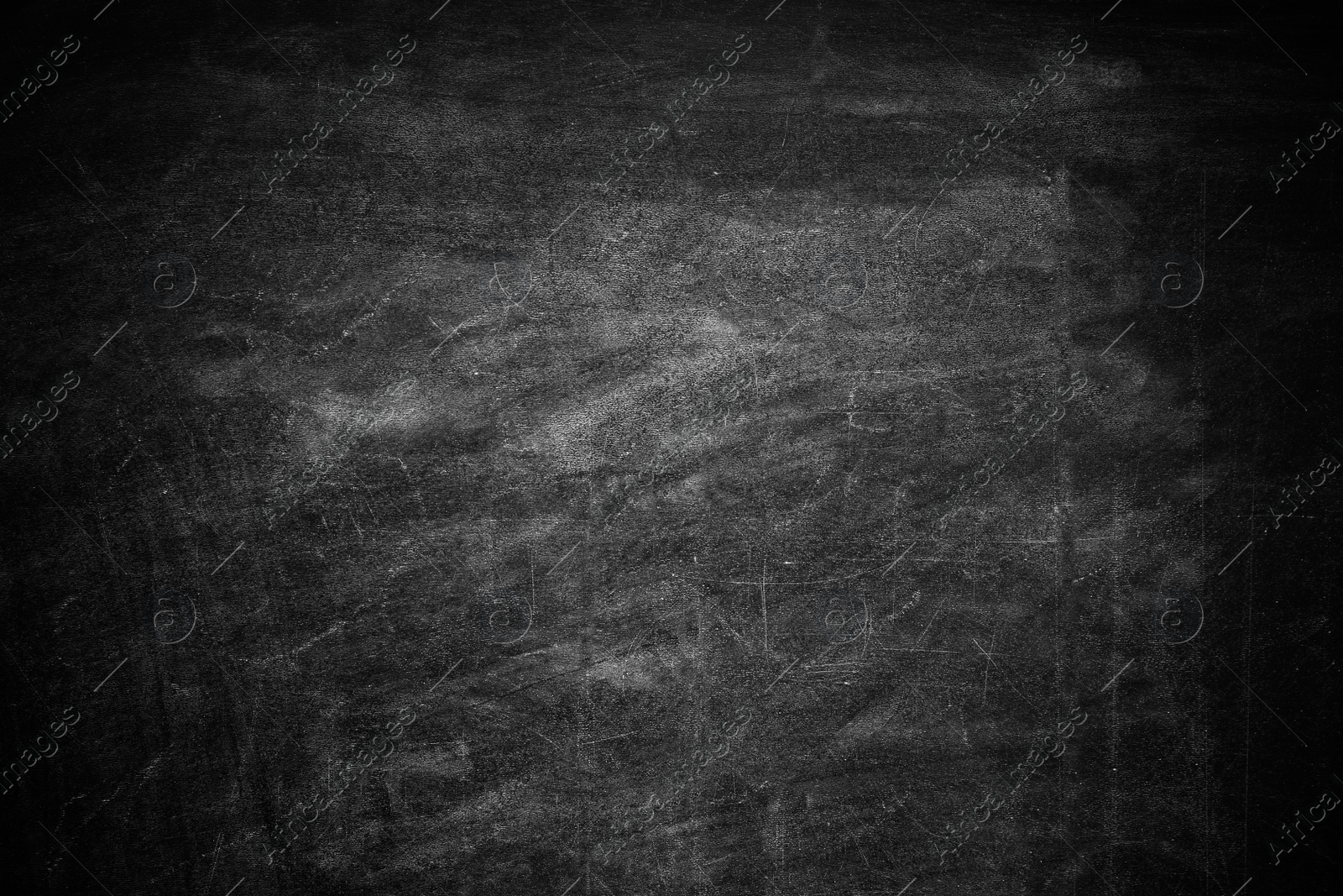 Photo of Dirty black chalkboard as background. Space for text