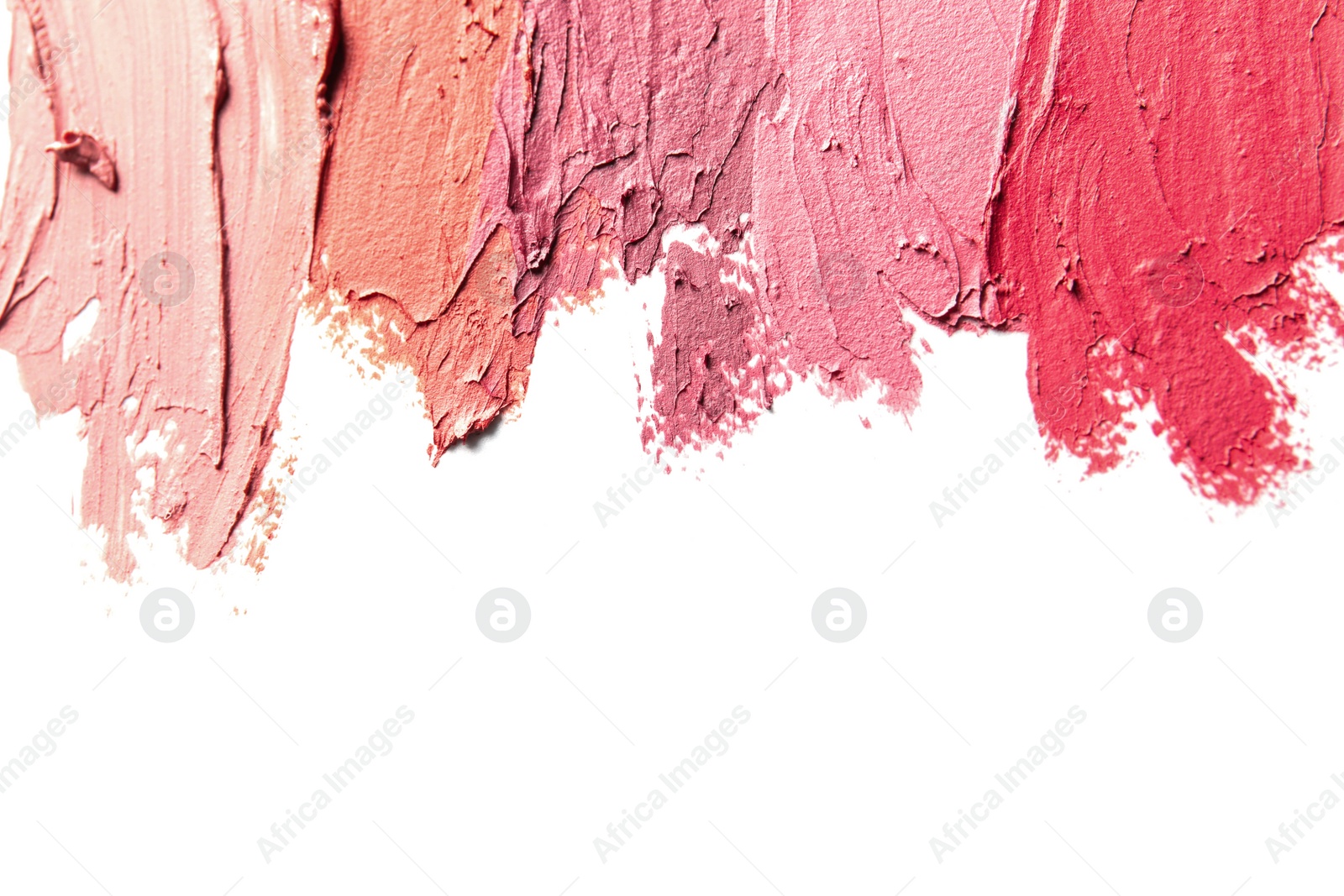 Photo of Lipstick smears isolated on white, top view. Space for text