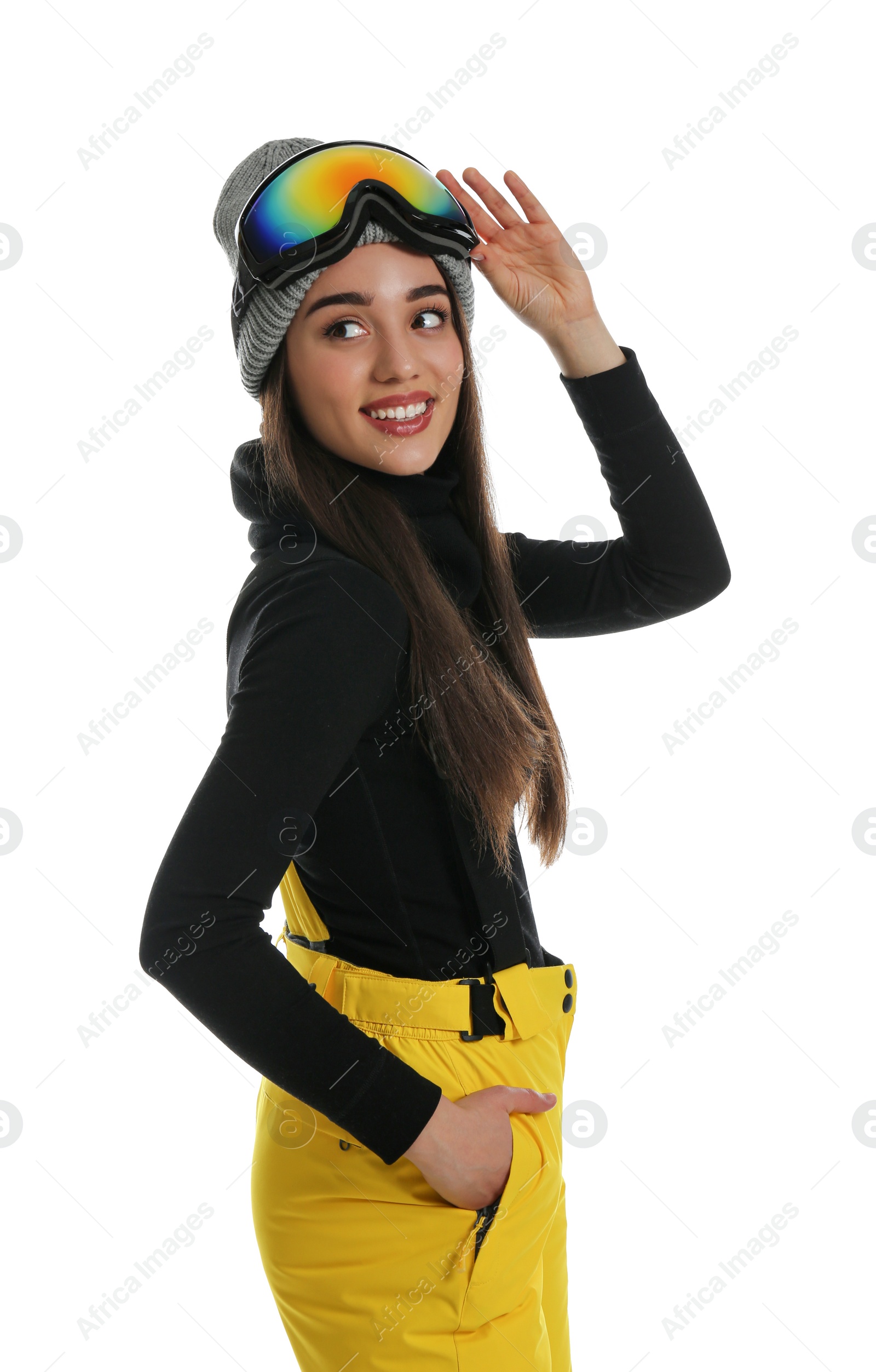 Photo of Woman wearing stylish winter sport clothes on white background