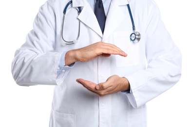 Photo of Male doctor holding something on white background, closeup