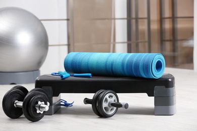 Set of fitness equipment of floor indoors