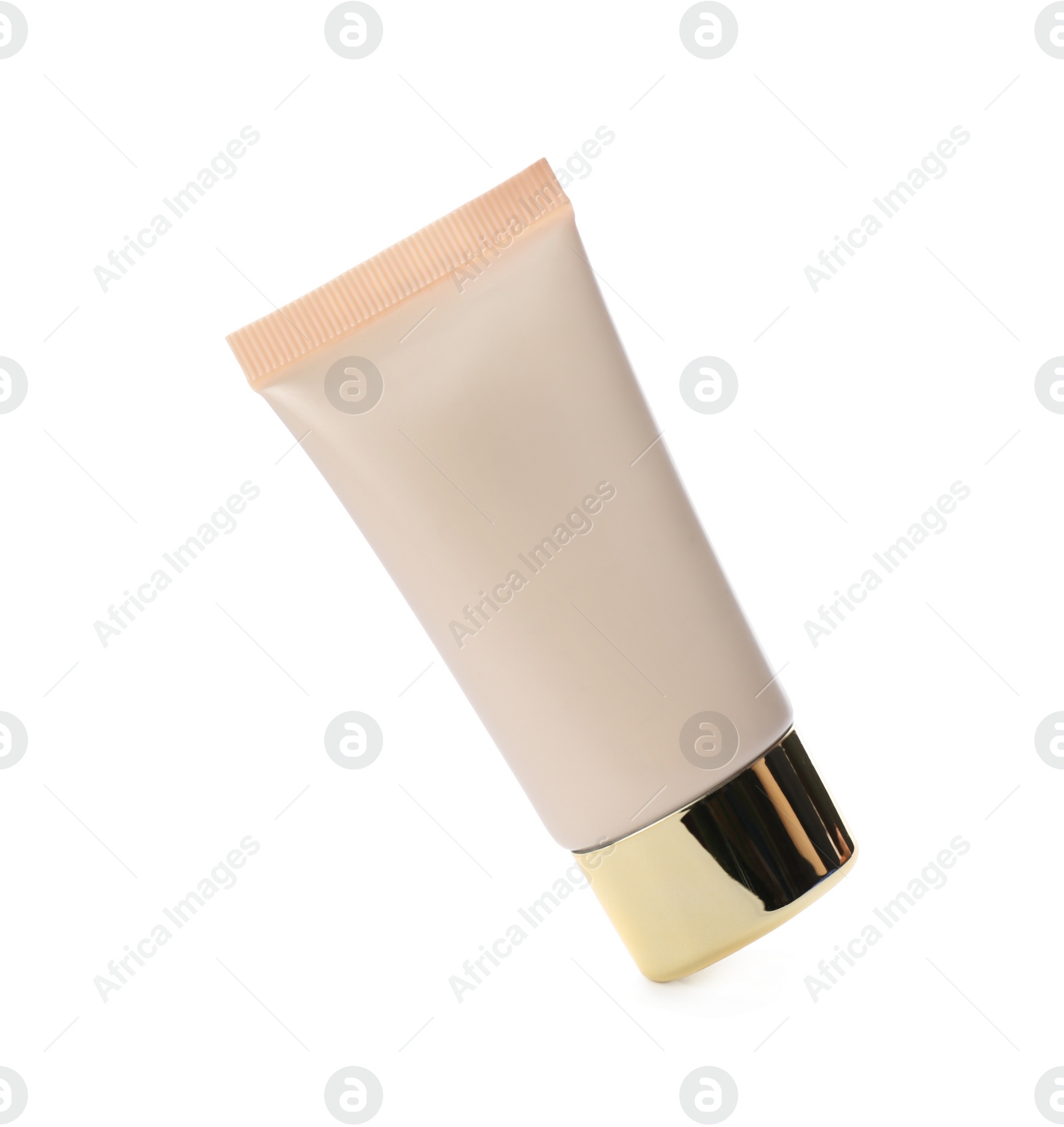 Photo of Tube of skin foundation isolated on white. Makeup product