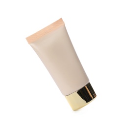 Photo of Tube of skin foundation isolated on white. Makeup product