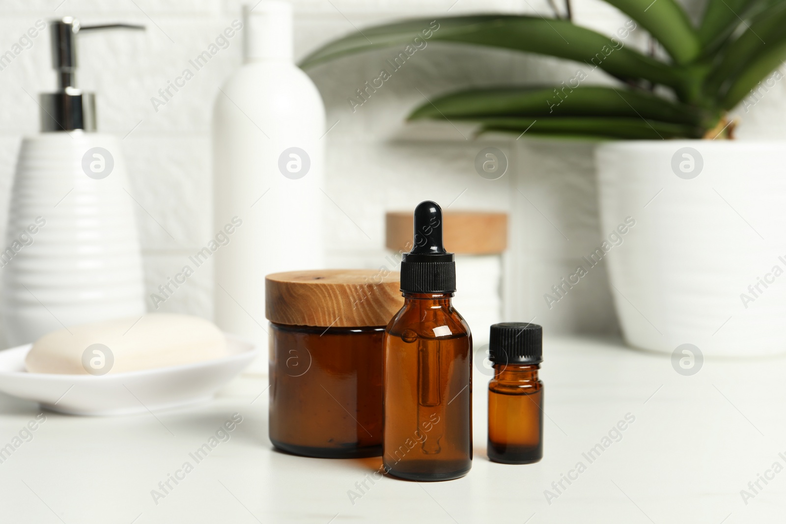 Photo of Bath accessories. Personal care products on white table, closeup