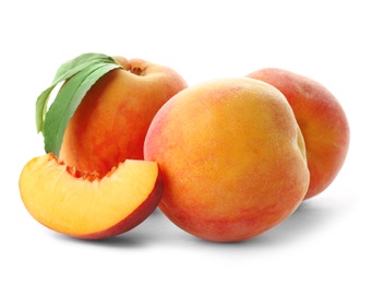 Fresh sweet peaches on white background