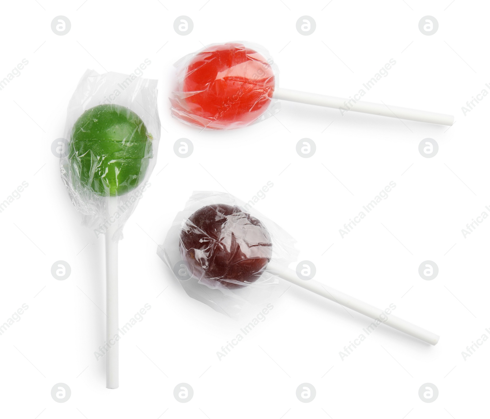 Photo of Delicious colorful candies on white background, top view