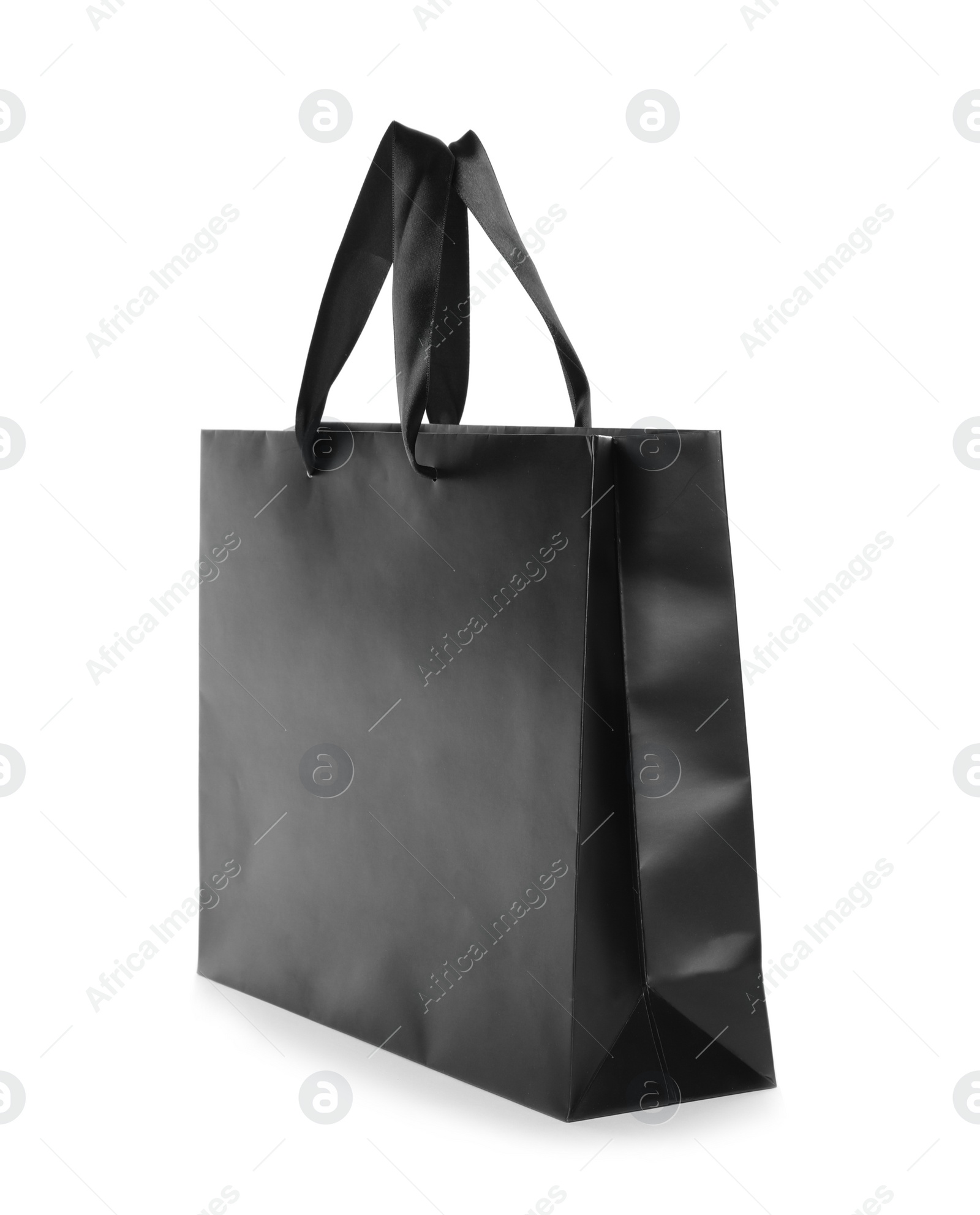 Photo of Paper shopping bag isolated on white. Mock up for design