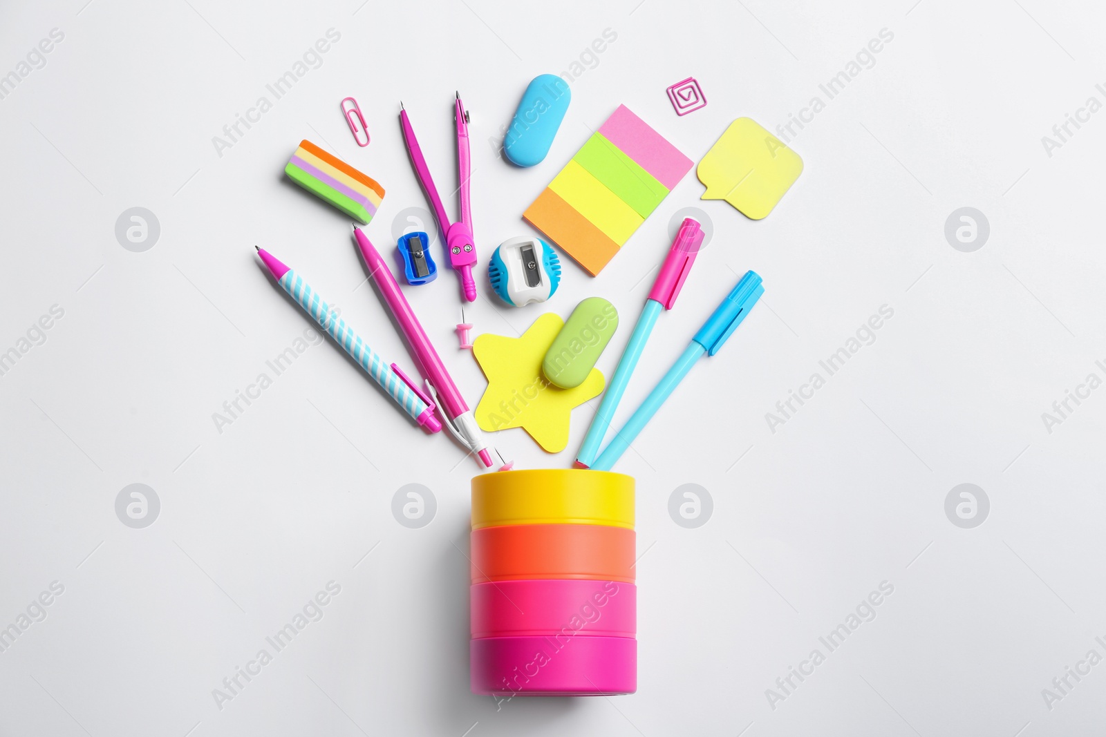 Photo of Flat lay composition with school stationery on white background. Back to school