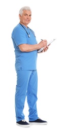 Full length portrait of male doctor in scrubs with clipboard isolated on white. Medical staff