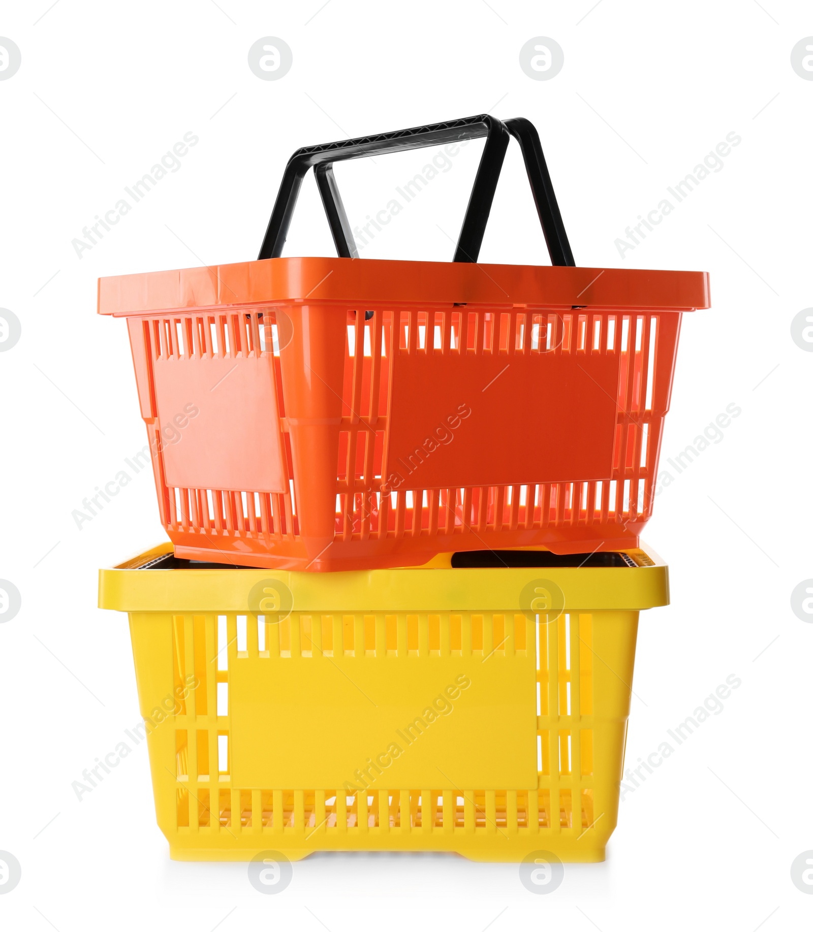 Photo of Color plastic shopping baskets isolated on white