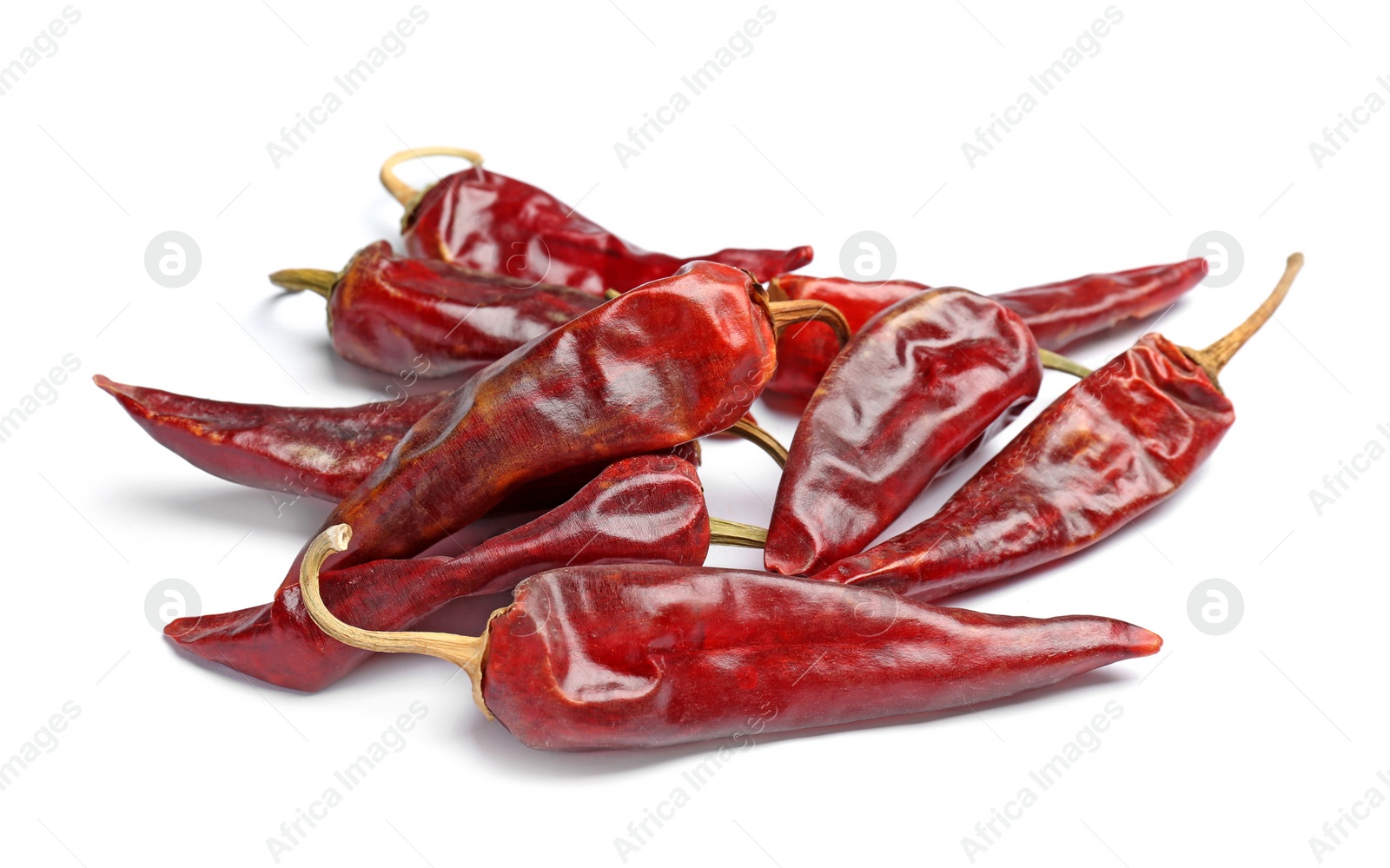 Photo of Dry chili peppers on white background