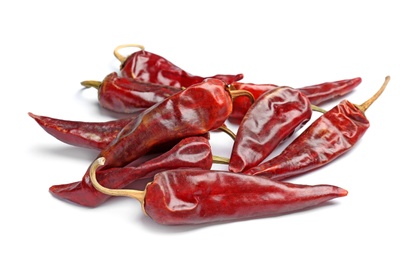 Photo of Dry chili peppers on white background