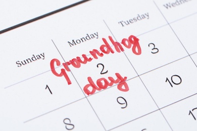 Photo of Calendar with date reminder about Groundhog day, closeup