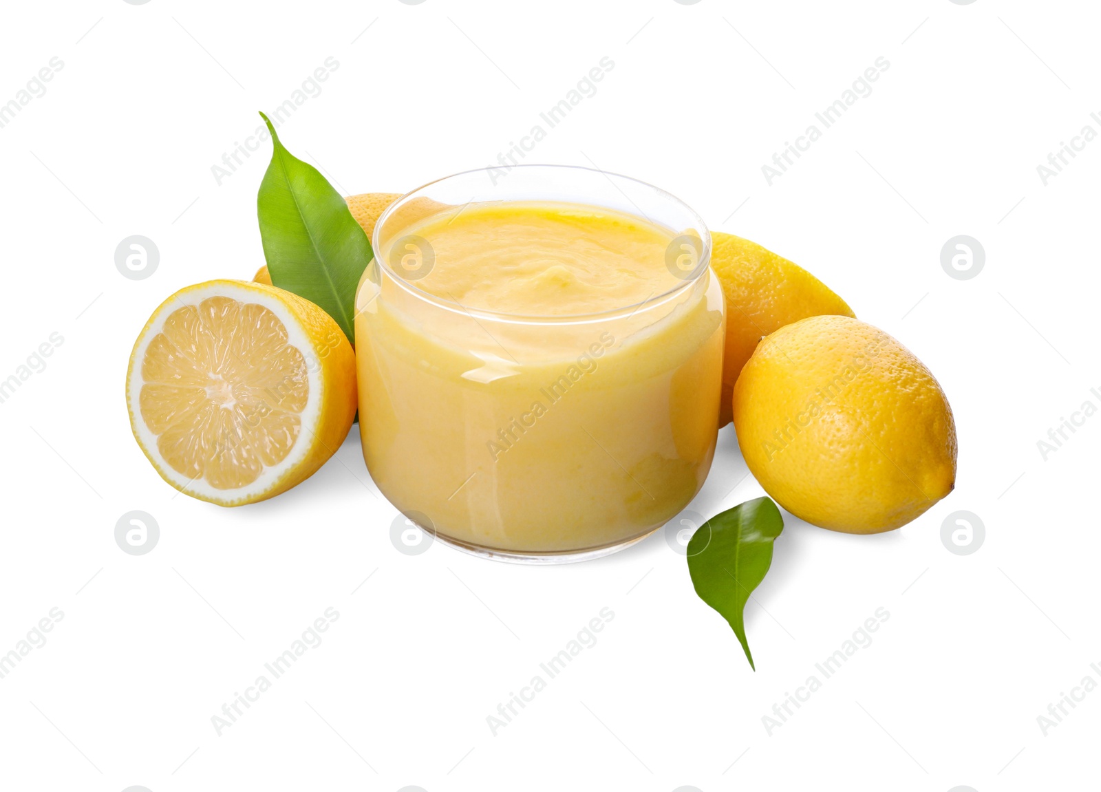 Photo of Delicious lemon curd in glass jar, fresh citrus fruits and green leaves isolated on white