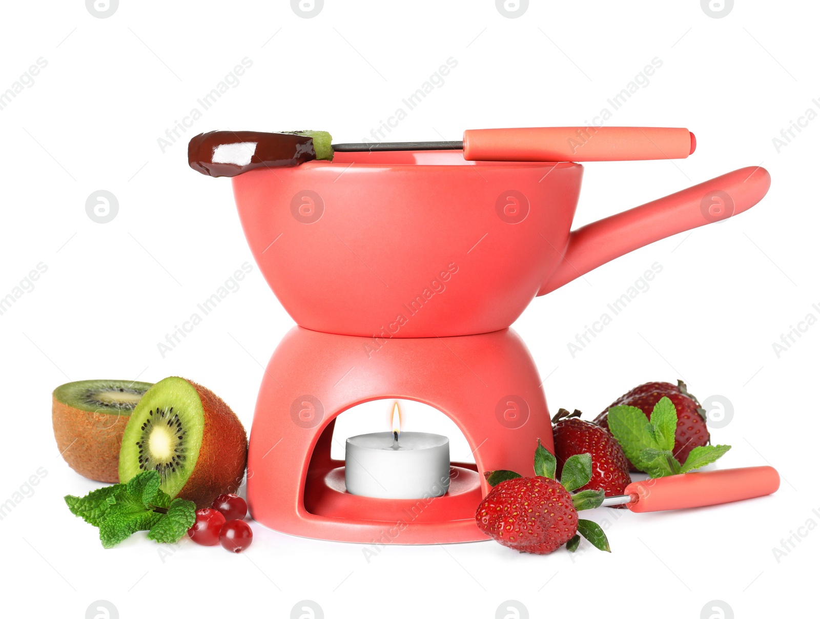 Photo of Fondue pot with chocolate, fruits and berries isolated on white