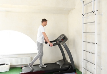 Photo of Patient training on treadmill in rehabilitation center