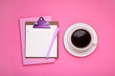 Photo of To do notes, planner, pen and cup of coffee on pink background, flat lay. Space for text
