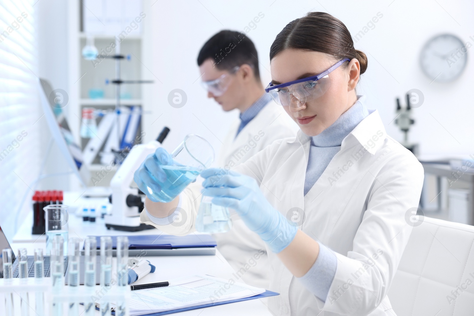 Photo of Scientists working with samples in laboratory. Medical research