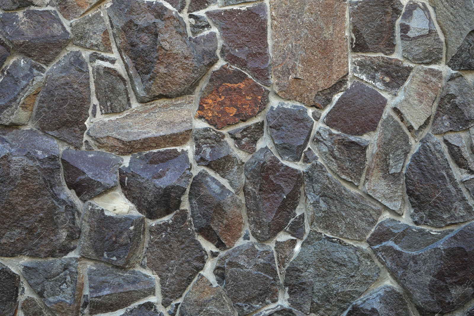 Photo of Stone surface as background, closeup. Seamless texture