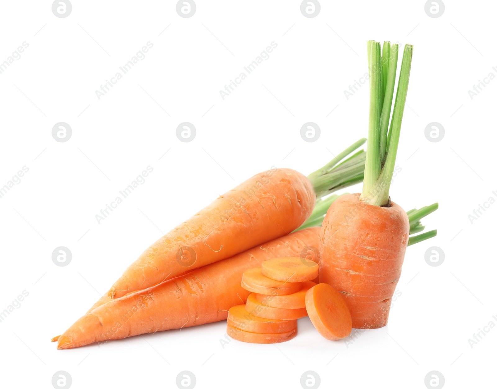 Photo of Whole and cut ripe carrots isolated on white