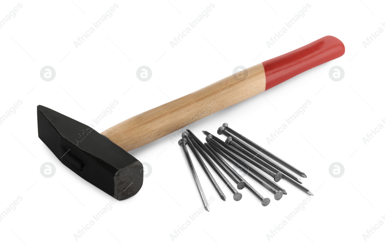 Photo of Hammer and metal nails on white background