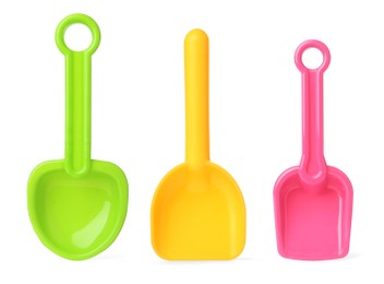 Image of Different bright plastic toy shovels on white background, collage 