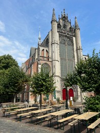 Leiden, Netherlands - August 28, 2022; Beautiful view of Hooglandse Kerk and trees on sunny day