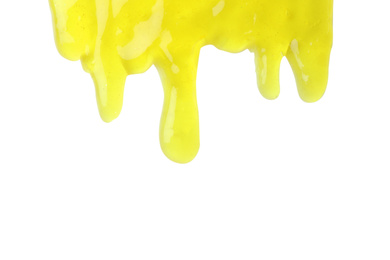 Photo of Flowing yellow slime on white background. Antistress toy