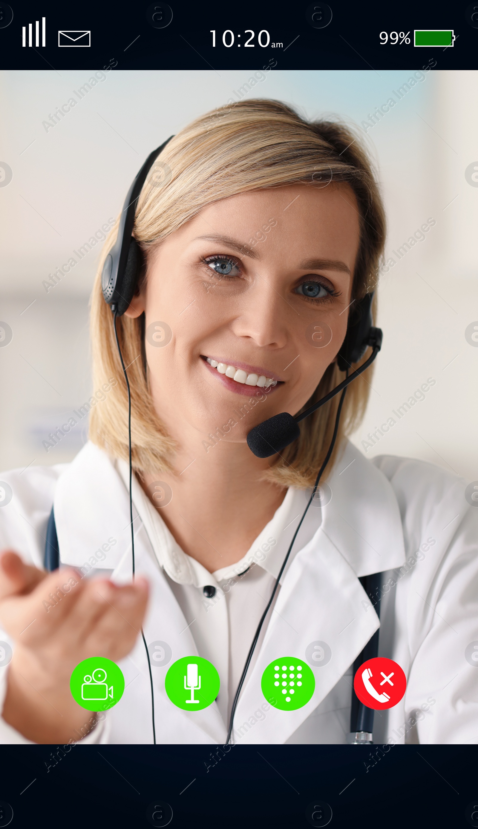 Image of Online medical consultation. Doctor with headset working via video chat application